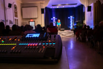 Panoramic view of illuminated stage at concert