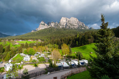 Panoramic view of trees and mountains against sky