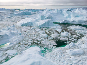 Aerial view of snow covered landscape