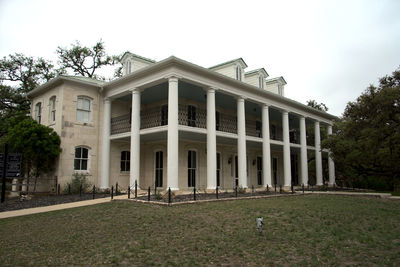 Facade of historic building against sky