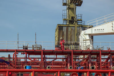 Low angle view of construction site against sky