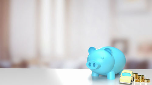 Close-up of piggy bank on table