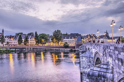 Riverfront in maastricht, the netherlands, during the blue hour