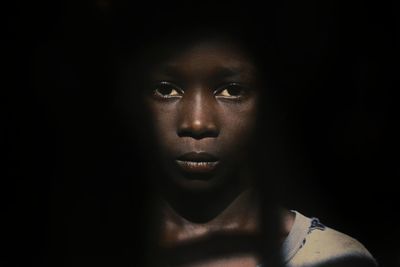 Close-up portrait of a serious young woman