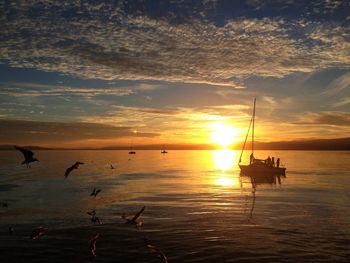 Scenic view of sea at sunset