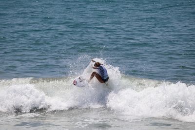 Man surfing in sea