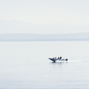 Boat sailing in sea