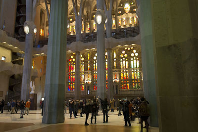 Group of people in illuminated building