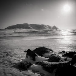 Scenic view of sea against sky during winter