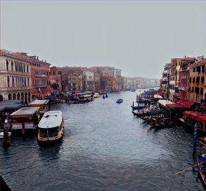 View of boats moored in canal