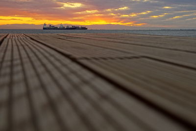 Scenic view of beach against sky during sunset