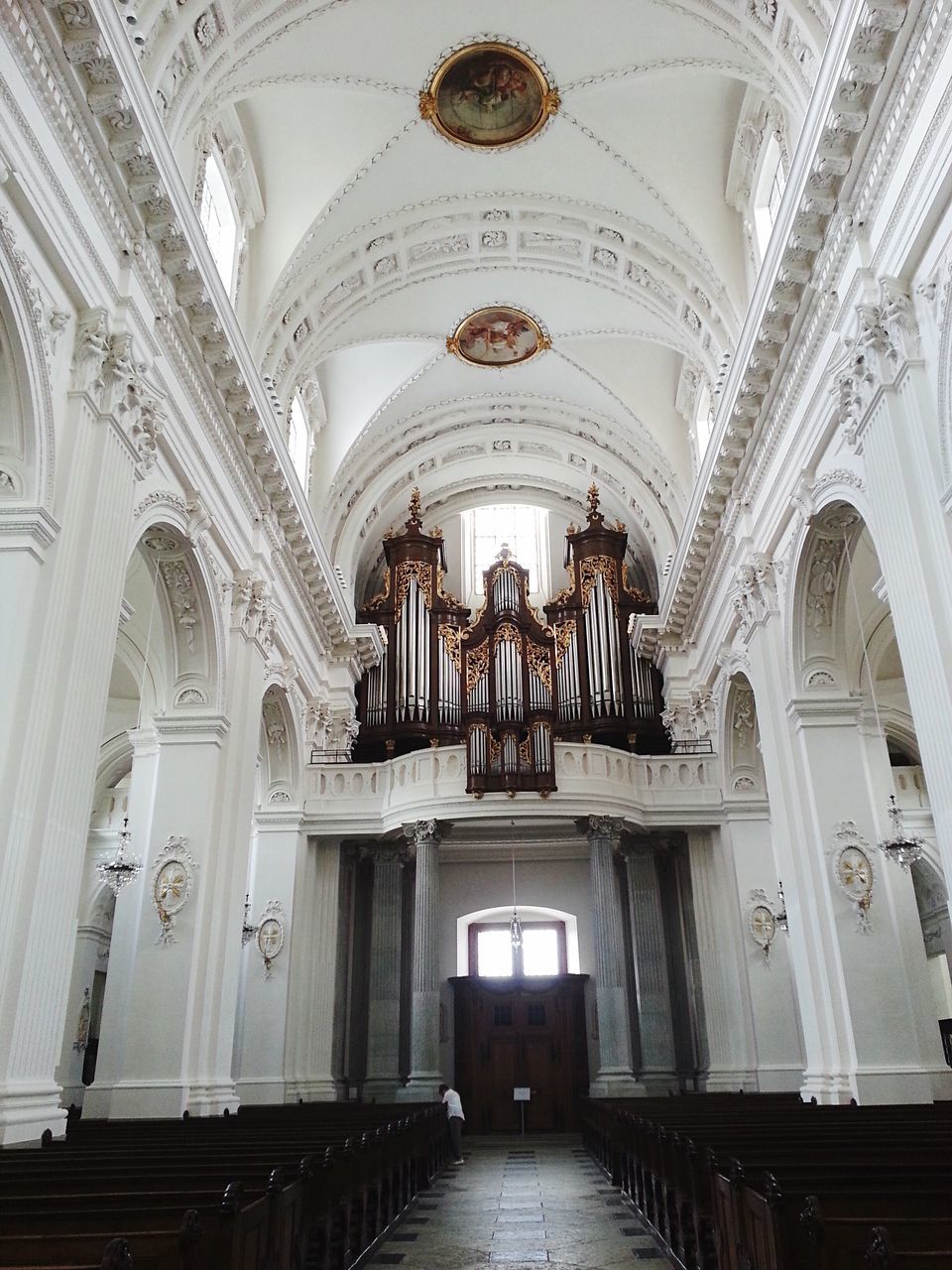 religion, spirituality, indoors, place of worship, arch, ceiling, architectural column, travel destinations, no people, pew, architecture, day