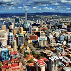 High angle view of buildings in city against sky