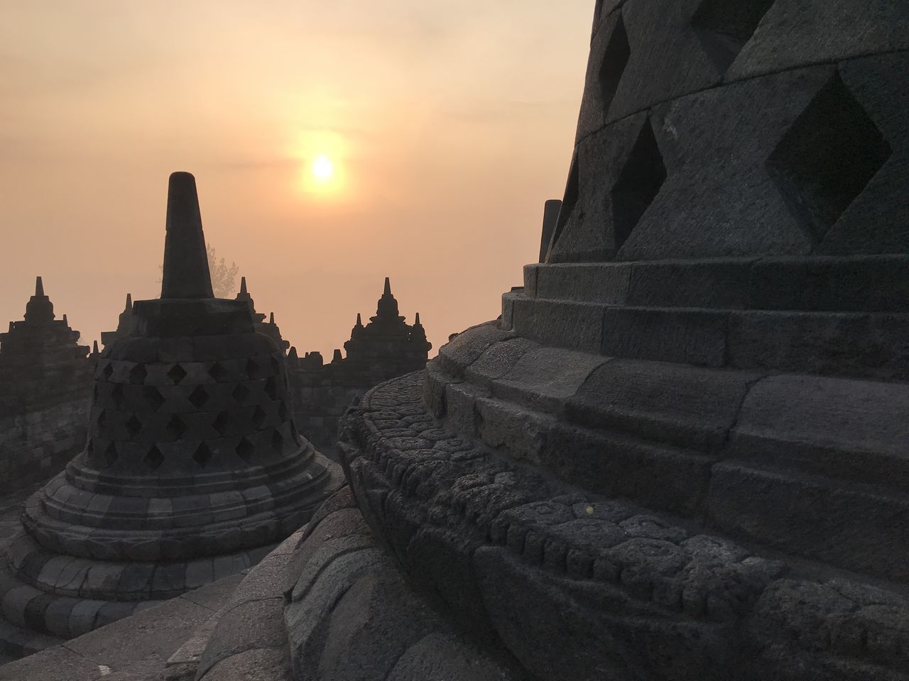 PANORAMIC VIEW OF TEMPLE AGAINST BUILDING