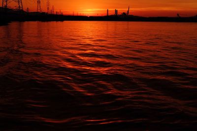 Scenic view of sea at sunset