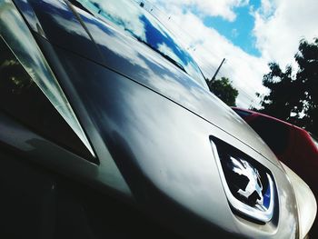 Low angle view of car against sky