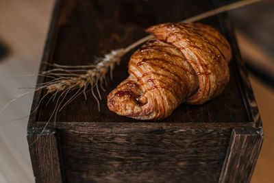 Close-up of bread on wooden table