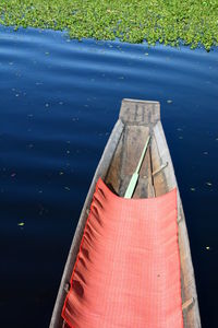 High angle view of boat moored in lake