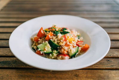 Close-up of salad served on table