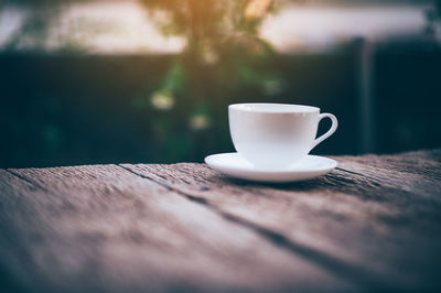 Close-up of coffee cup on table