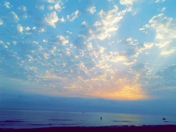 Scenic view of sea at sunset