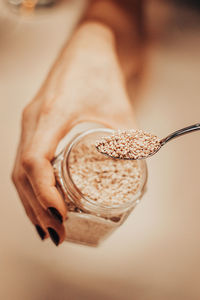 Close-up of hand holding ice cream