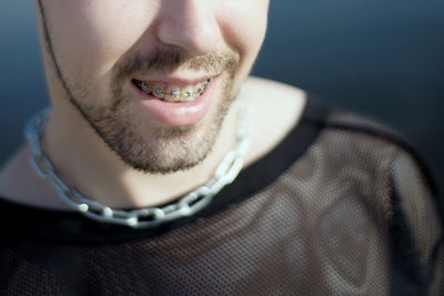 Close-up portrait of a smiling mid adult man