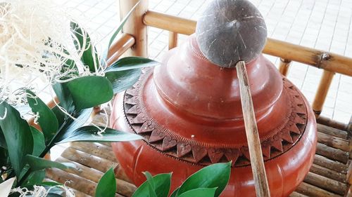 High angle view of mud pot on wooden table