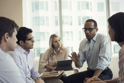 Business people in meeting having interesting discussion