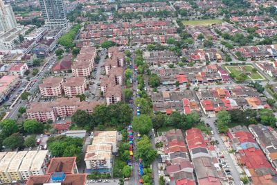 High angle view of buildings and street in city