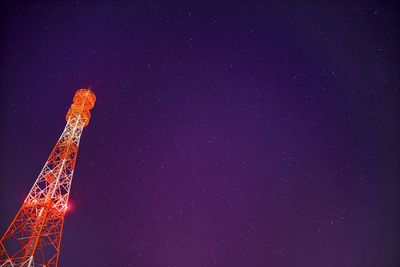 Low angle view of illuminated stars against sky at night