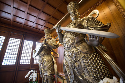 Low angle view of statue at temple