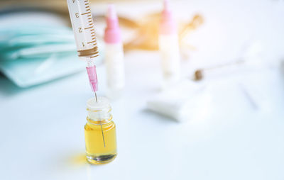 Close-up of yellow juice on table