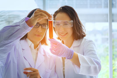 Scientists working in laboratory