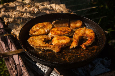 Close-up of meat on barbecue grill