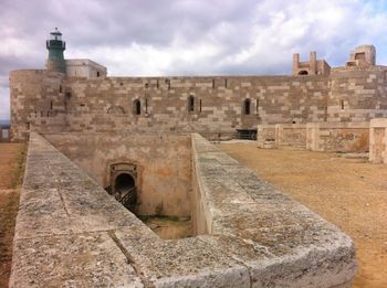 View of fort against cloudy sky