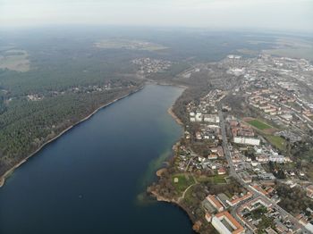 High angle view of river amidst buildings in city