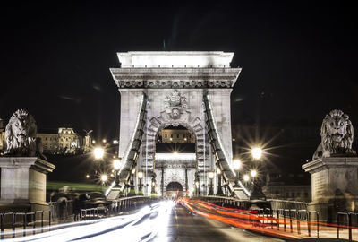 View of suspension bridge at night