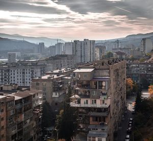 High angle view of buildings in city against sky