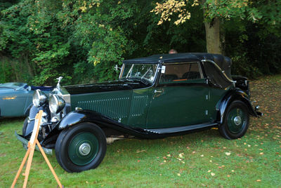 Vintage car parked on land