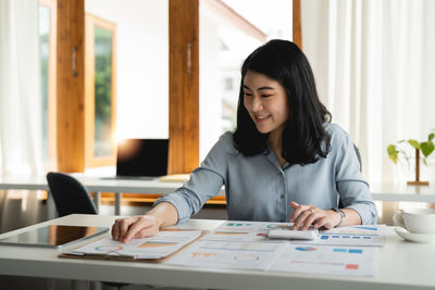 Businesswoman working at office