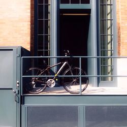 Bicycle against door of house