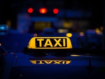 Cropped image of human foot by fish in fishing net