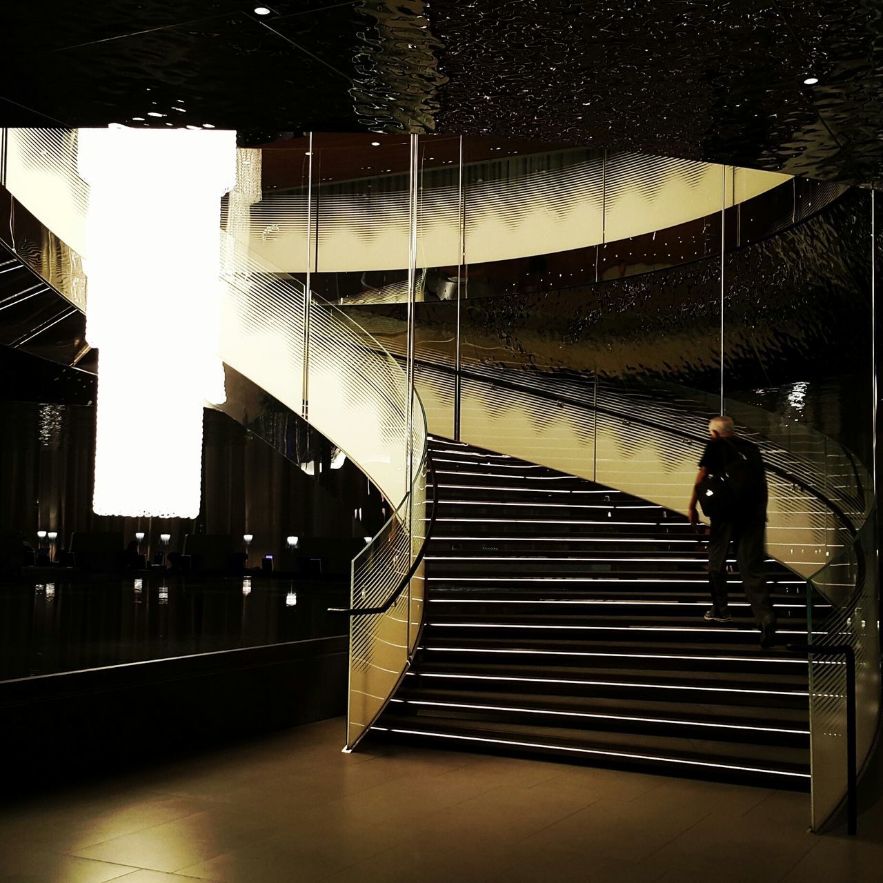 railing, built structure, architecture, illuminated, steps, night, indoors, staircase, building exterior, steps and staircases, modern, empty, the way forward, city, absence, building, no people, connection, shadow, sunlight