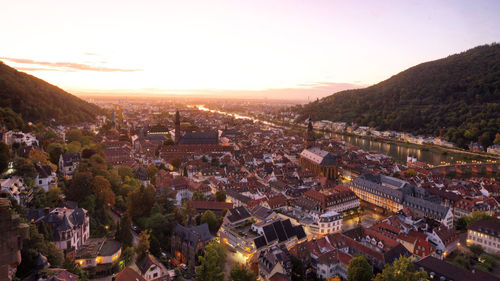 High angle view of townscape against sky during sunset