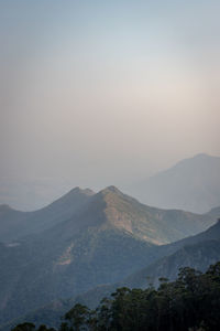 Scenic view of mountains against sky during sunset