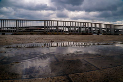 Bridge over sea against sky