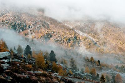 Aerial view of landscape during foggy weather