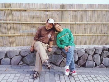 Full length portrait of a smiling young couple