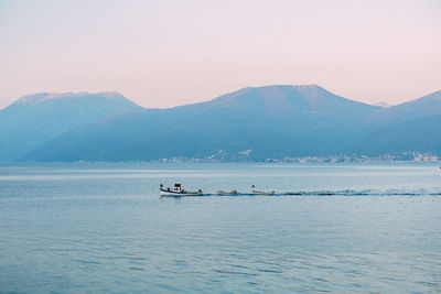 Scenic view of sea against mountains